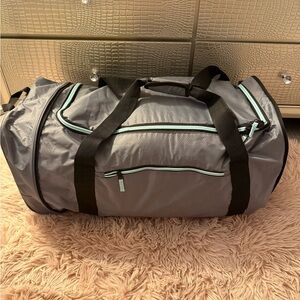 Gray duffel bag with wheels